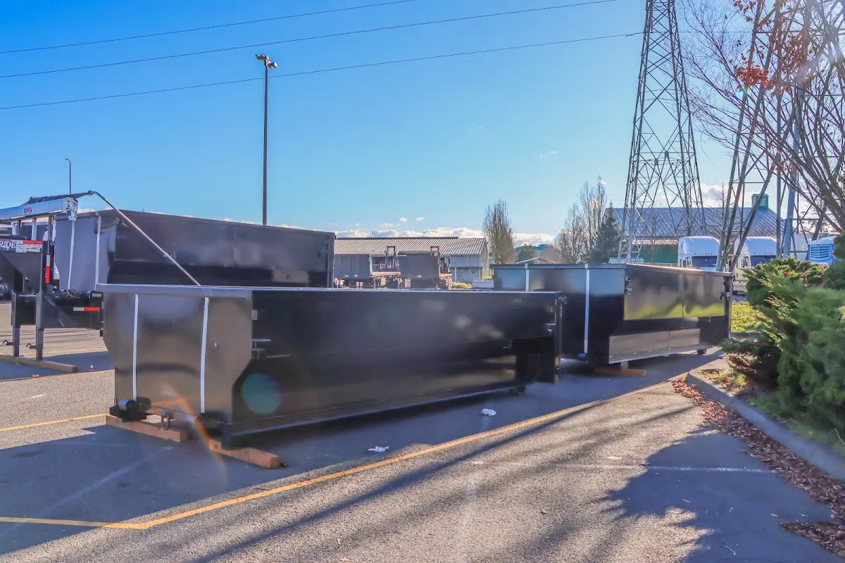 Roll-off dumpster ready for waste disposal at job site for 12 Yard Dumpster Rental in Walden